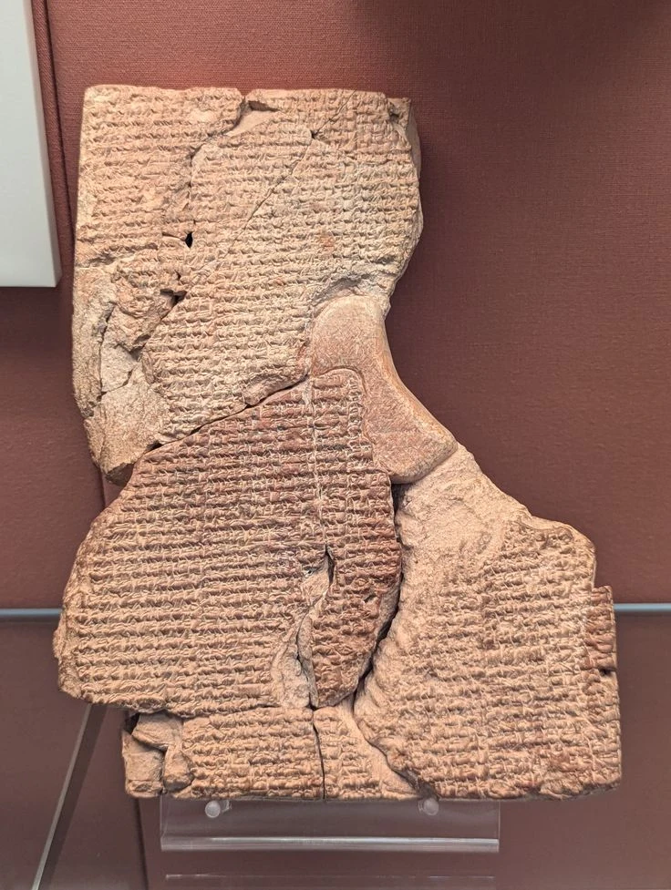 Clay tablet of Atraḫasīs at the British Museum. The photographer identifies it with the flood tradition, not the human-creation lines. Photograph: SpeakingArch, 2026 / Wikimedia Commons, CC BY-SA 4.0; resized and converted to WebP for display
