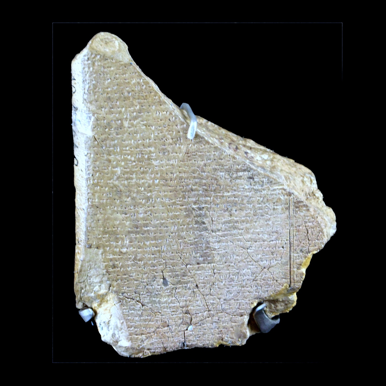 Baal Cycle tablet AO 16640 / RS 3.367 from Ugarit, about 1400–1200 BCE, associated with KTU 1.2; Louvre. Not the palace-authorization tablet KTU 1.4. A photograph of actual textual evidence, not imagined gods