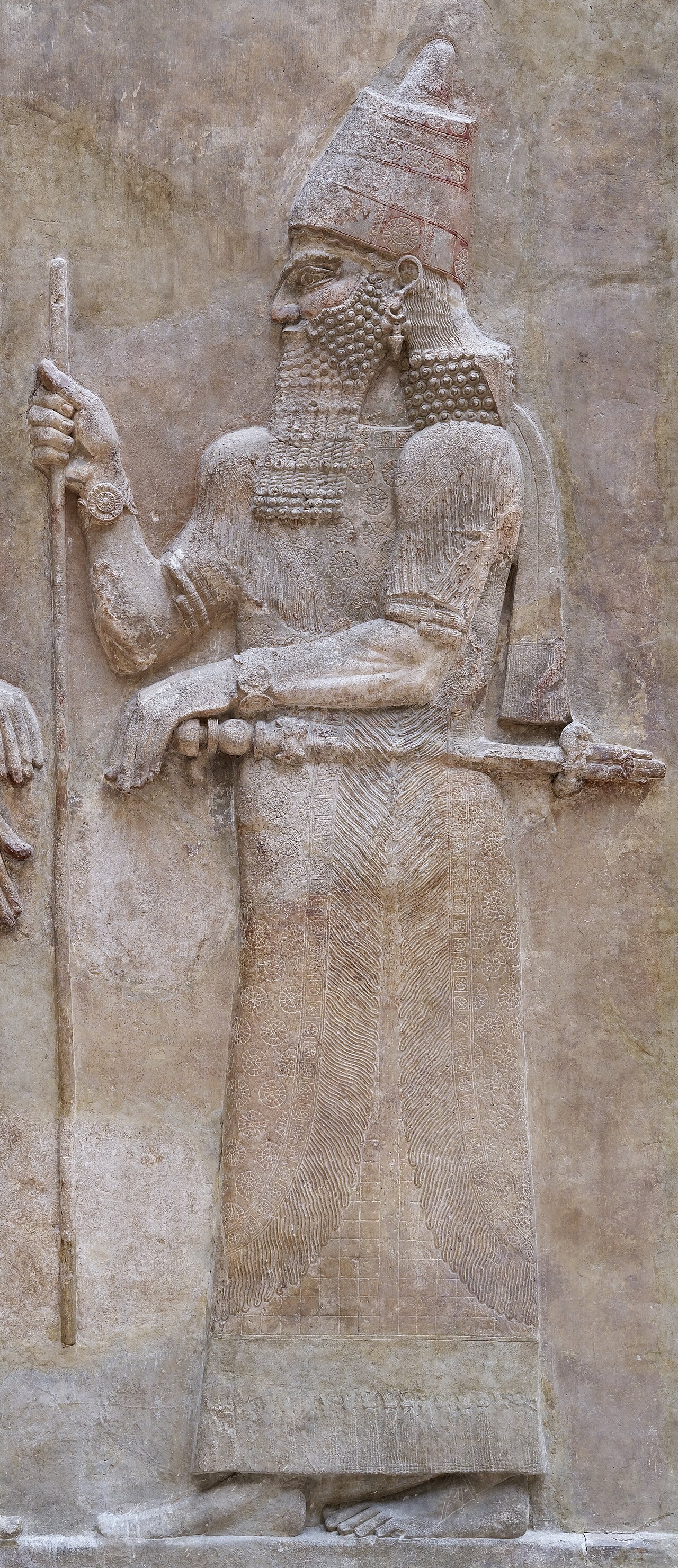 Sargon II in a relief from Dur-Sharrukin, modern Khorsabad in Iraq, dated by the Louvre to his reign, 721–705 BCE. This source crop shows the king in the scene catalogued as AO 19873 and AO 19874