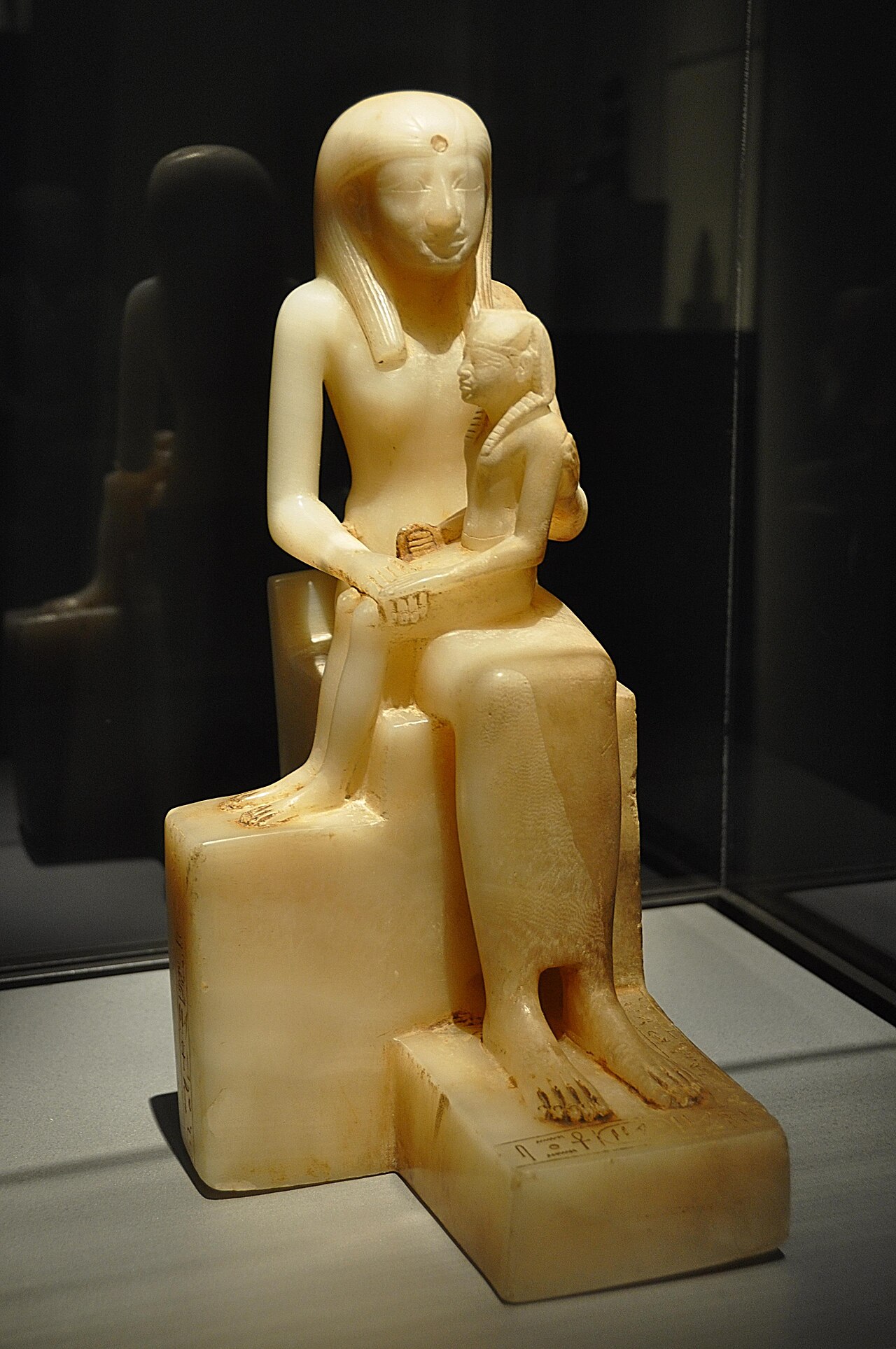 Queen Ankhnes-meryre II with her son King Pepi II on her lap, in an Egyptian-alabaster statuette of the Sixth Dynasty, late third millennium BCE. Brooklyn Museum, 39.119. Photograph by Stephen Sandoval, February 2009