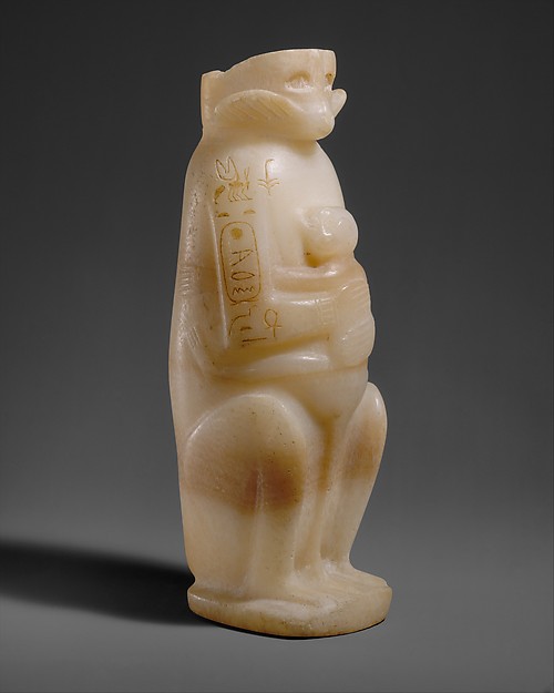 Egyptian-alabaster vase shaped as a mother monkey holding her young, inscribed with King Merenre I’s name. The Met dates it to about 2255–2246 BCE; object 30.8.134. The royal inscription appears on the shoulder