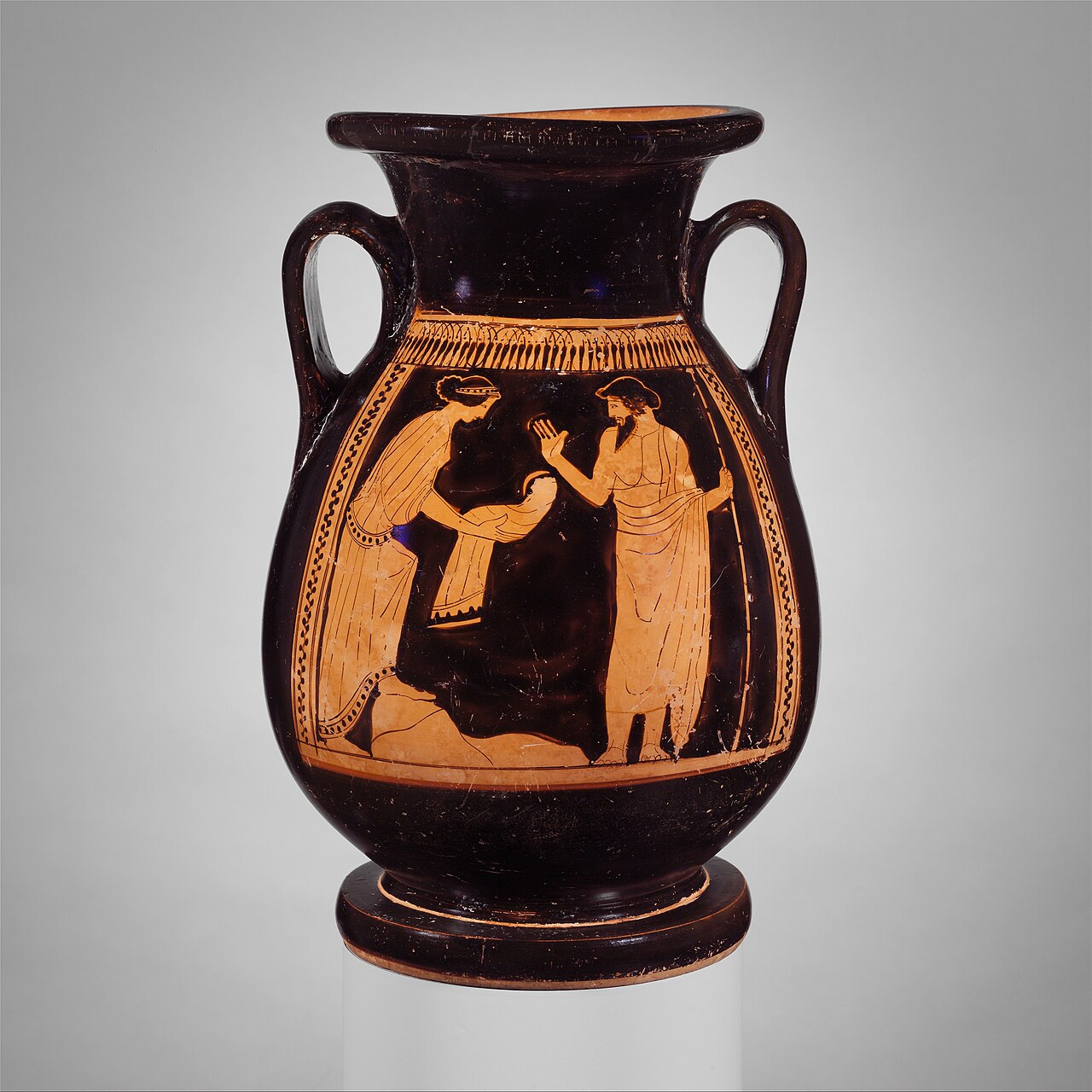 Rhea hands Kronos a wrapped stone on an Attic jar, about 460–450 BCE, attributed to the Nausicaä Painter. Metropolitan Museum of Art, 06.1021.144; museum photograph