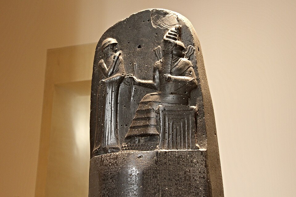 Upper part of Hammurabi’s eighteenth-century BCE stele, Louvre SB 8: the king before seated Shamash and the beginning of the inscription. The photograph does not identify talion clauses 196–214